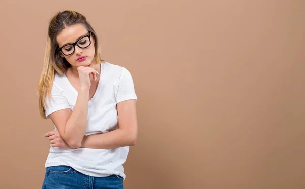 Besorgte junge Frau — Stockfoto