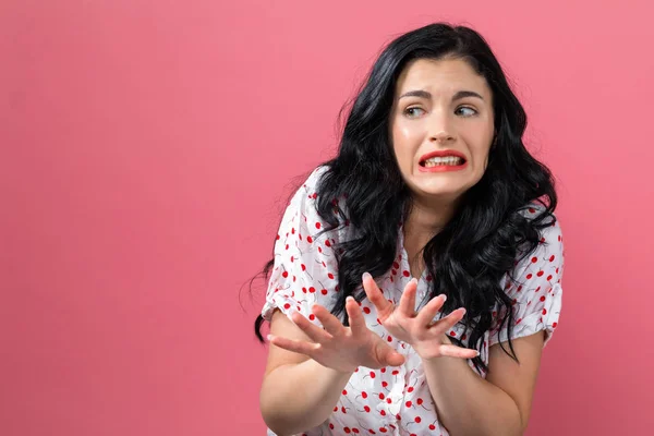 Walgt gezicht expressie met jonge vrouw — Stockfoto