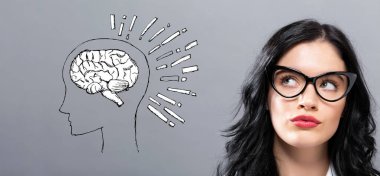 Brain illustration with young businesswoman clipart