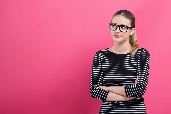 Mujer joven en una pose reflexiva — Foto de Stock