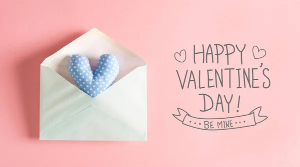 Valentines Day message with a blue heart cushion — Stock Photo, Image