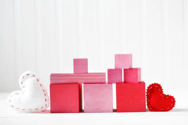 Pink and red blocks with hearts — Stock Photo, Image