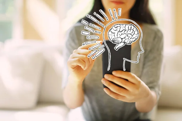 Brain illustration with woman using a smartphone