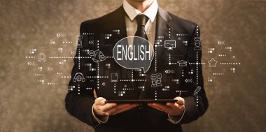 Bir tablet bilgisayar tutan işadamı ile İngilizce 