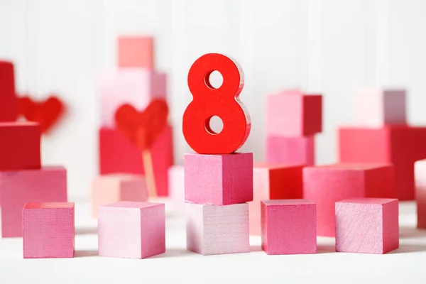 Red and pink wooden blocks with number 8 — Stock Photo, Image