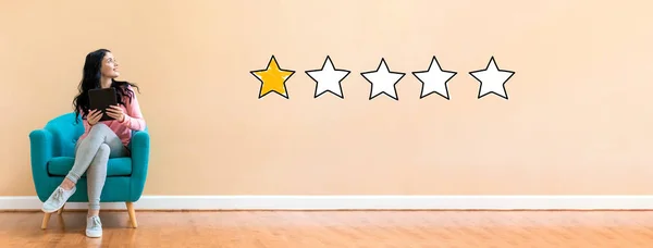 One Star Rating with woman using a tablet — Stock Photo, Image