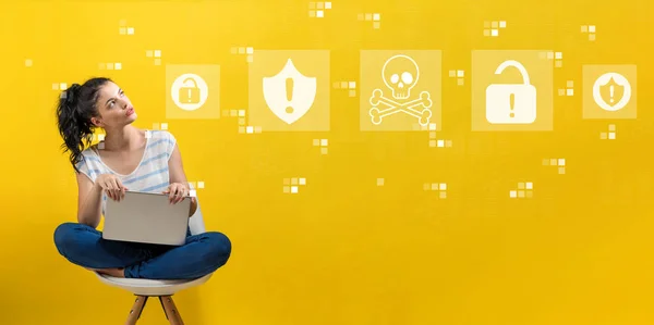 Virus and scam theme with woman using a laptop — Stock Photo, Image