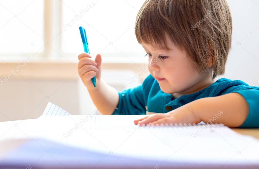Toddler boy drawing