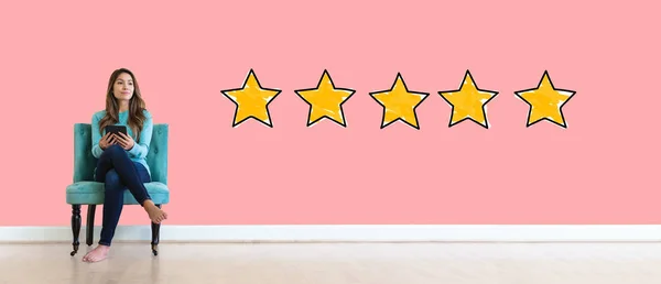 Five star rating with young woman — Stock Photo, Image