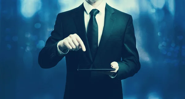 Businessman holding a tablet computer — Stock Photo, Image