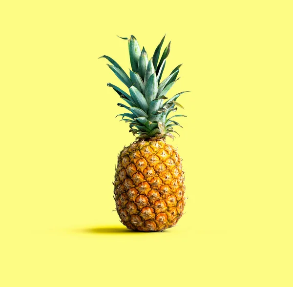 Pineapple on solid color background