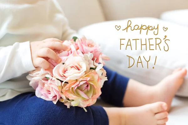 Fathers Day message with toddler boy with flowers — Stock Photo, Image