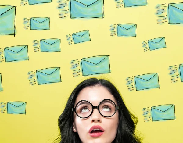 Many sketch emails with young woman — Stock Photo, Image