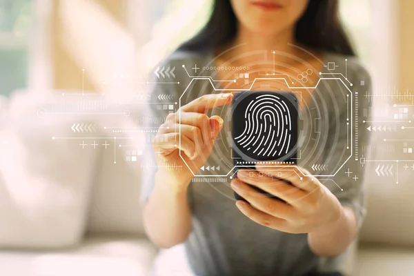 Fingerprint scanning theme with woman using a smartphone — Stock Photo, Image