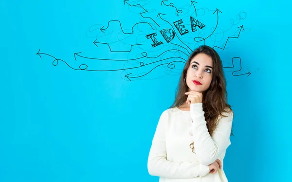 Brainstorming idea arrows with young woman — Stock Photo, Image