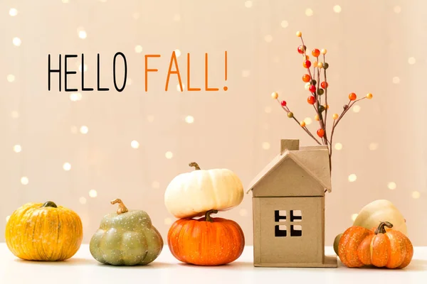Hello fall message with pumpkins with a house — Stock Photo, Image