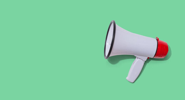 White megaphone with hard shadow