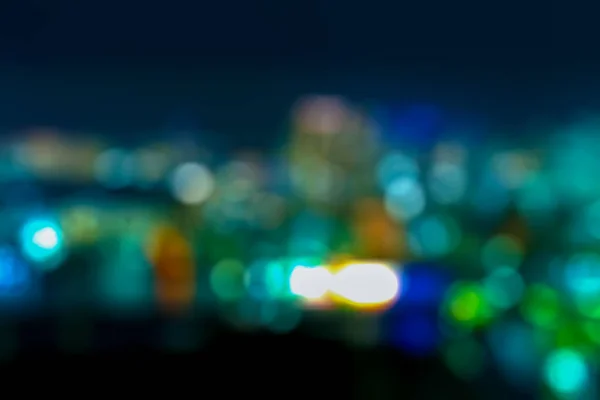 Abstract blurred night cityscape bokeh background — ストック写真