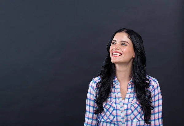 Jonge vrouw in een doordachte pose — Stockfoto