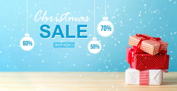 Christmas sale message with Christmas gift boxes — Stock Photo, Image