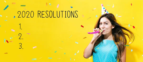 Resoluciones 2020 con mujer joven con tema de fiesta —  Fotos de Stock