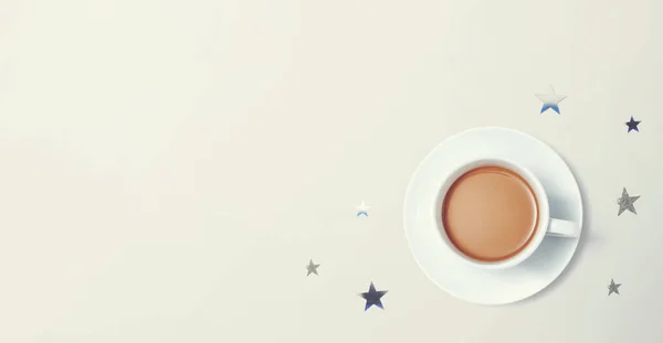 Eine Tasse Kaffee mit kleinen Sternen — Stockfoto