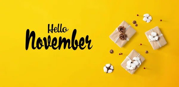 Hello November message with gift boxes with cottons