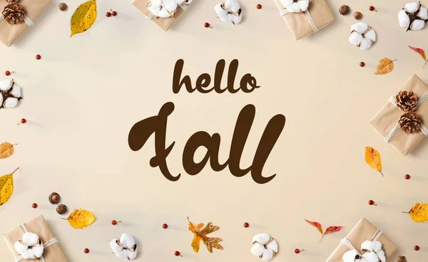 Hello fall message with gift boxes with leaves