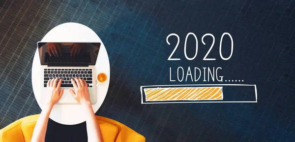 Loading new year 2020 with person using a laptop — Stock Photo, Image