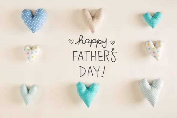 Fathers Day message with blue heart cushions — Stock Photo, Image