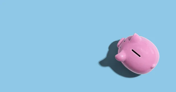 Pink piggy bank overhead view — Stockfoto