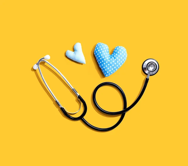 Medical worker appreciation theme with hearts and stethoscope — Stock Photo, Image
