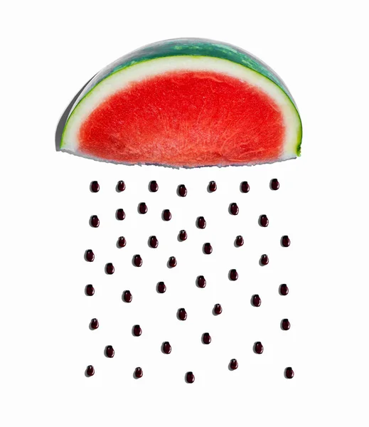 Vattenmelon och frön regn koncept — Stockfoto