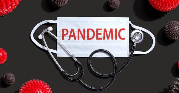 Pandemisch thema met masker en stethoscoop — Stockfoto