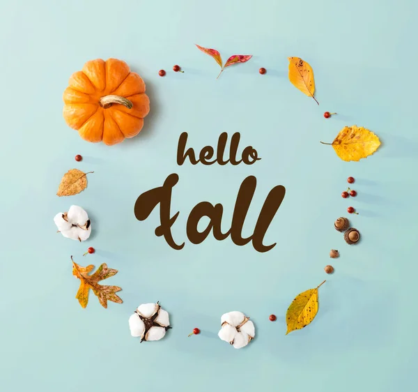 Hello fall message with autumn leaves and orange pumpkin — Stock Photo, Image