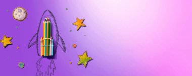 Bir roket ve renkli kalemlerle okula dönüş teması