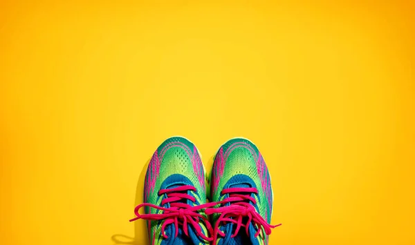 Pair of sport shoes with pink laces — Stock Photo, Image