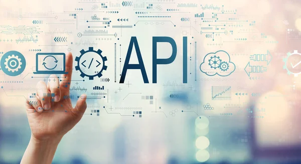 API - conceito de interface de programação de aplicativos com a mão pressionando um botão — Fotografia de Stock