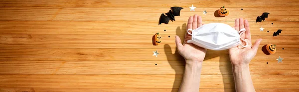 Facial masks with Halloween objects