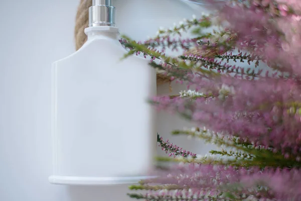 lavender flowers and bottle of perfume