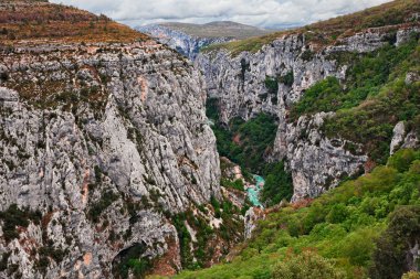 Verdon Gorge, Aiguines, Provence, France: landscape of the Falaises de Bauchet, a deep and impressive river canyon clipart