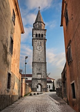 Pazin, Istria, Croatia: the bell tower of the ancient church of Saint Nicholas in the old town of the medieval city clipart