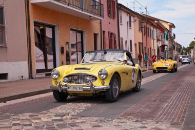 vintage British car Austin-Healey 100-6 (1957) in historical classic car race Mille Miglia. Gatteo, FC, Italy - May 19, 2018 clipart