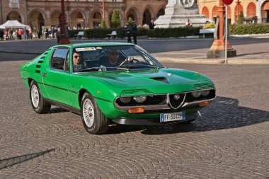 vintage Alfa Romeo Montreal (1972) running in classic car rally XIII Coppa Romagna on September 30, 2018 in Forli, Italy clipart