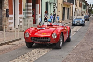 rare racing car Ferrari 500 Mondial (1954) in historical classic car race Mille Miglia, on May 19, 2017 in Gatteo, FC, Italy clipart