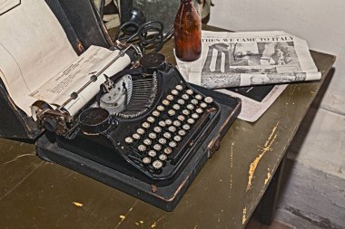 old typewriter in reproduction of military camp office of world war 2 exposed during the town feast 