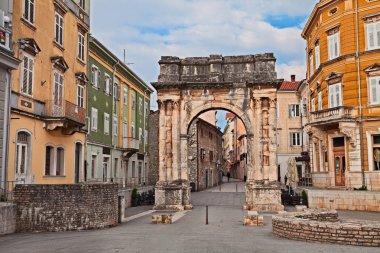 Pula, Istria, Croatia: the ancient Roman Triumphal Arch of the Sergii, one of the old city gate clipart