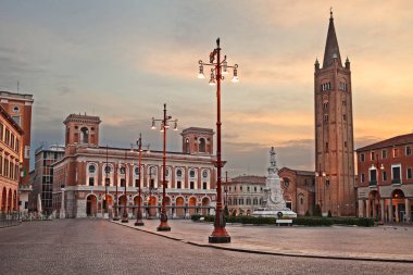 Forli, Emilia-Romagna, Italy: the square Aurelio Saffi with the abbey of San Mercuriale and the post office building clipart