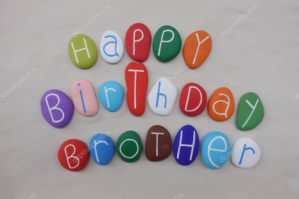 Happy Birthday Brother with colored stones over white sand