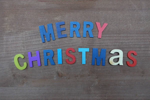 Feliz Mensaje Navidad Con Una Composición Letras Madera Colores — Foto de Stock